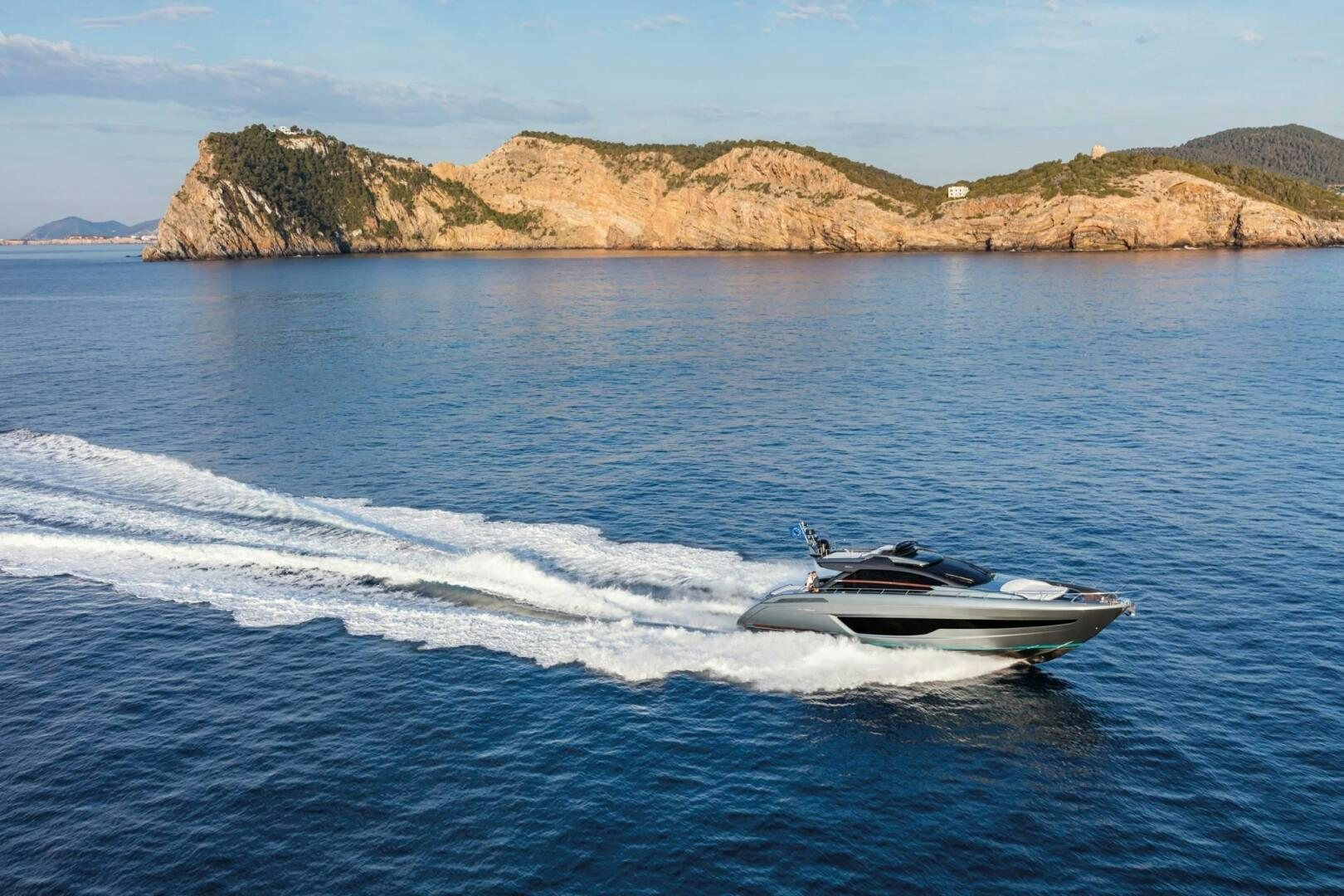a boat on the water aboard OUR TRADE Yacht for Sale