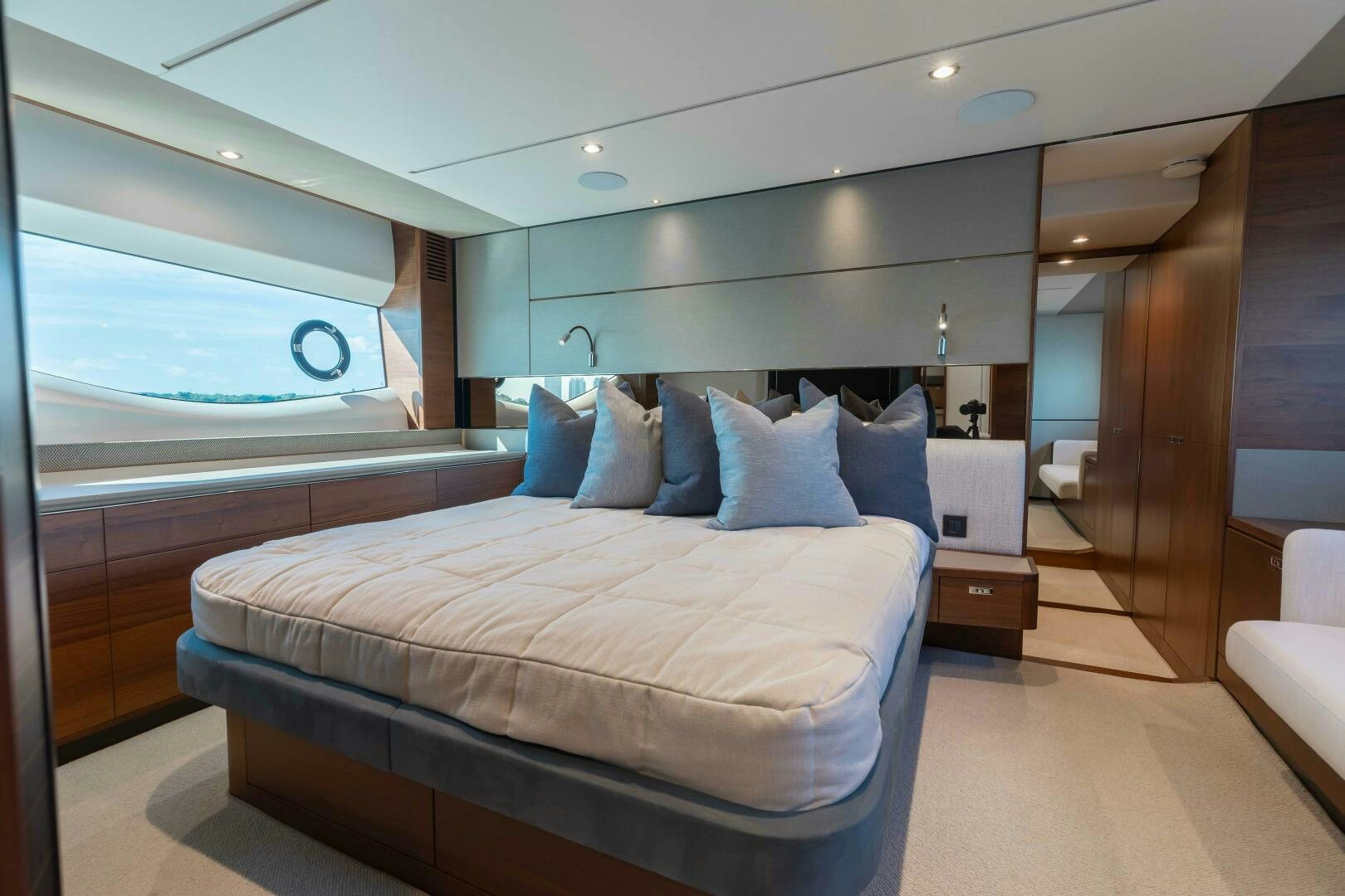 a room with a bed and a window aboard BEST OF YOU Yacht for Sale