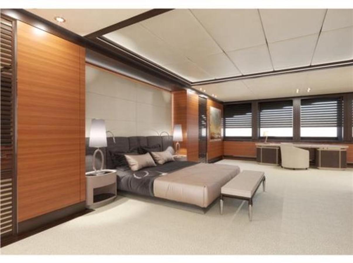 a large room with a bed and a desk aboard 85M SPADOLINI HELIPAD EXPEDITION YACHT Yacht for Sale