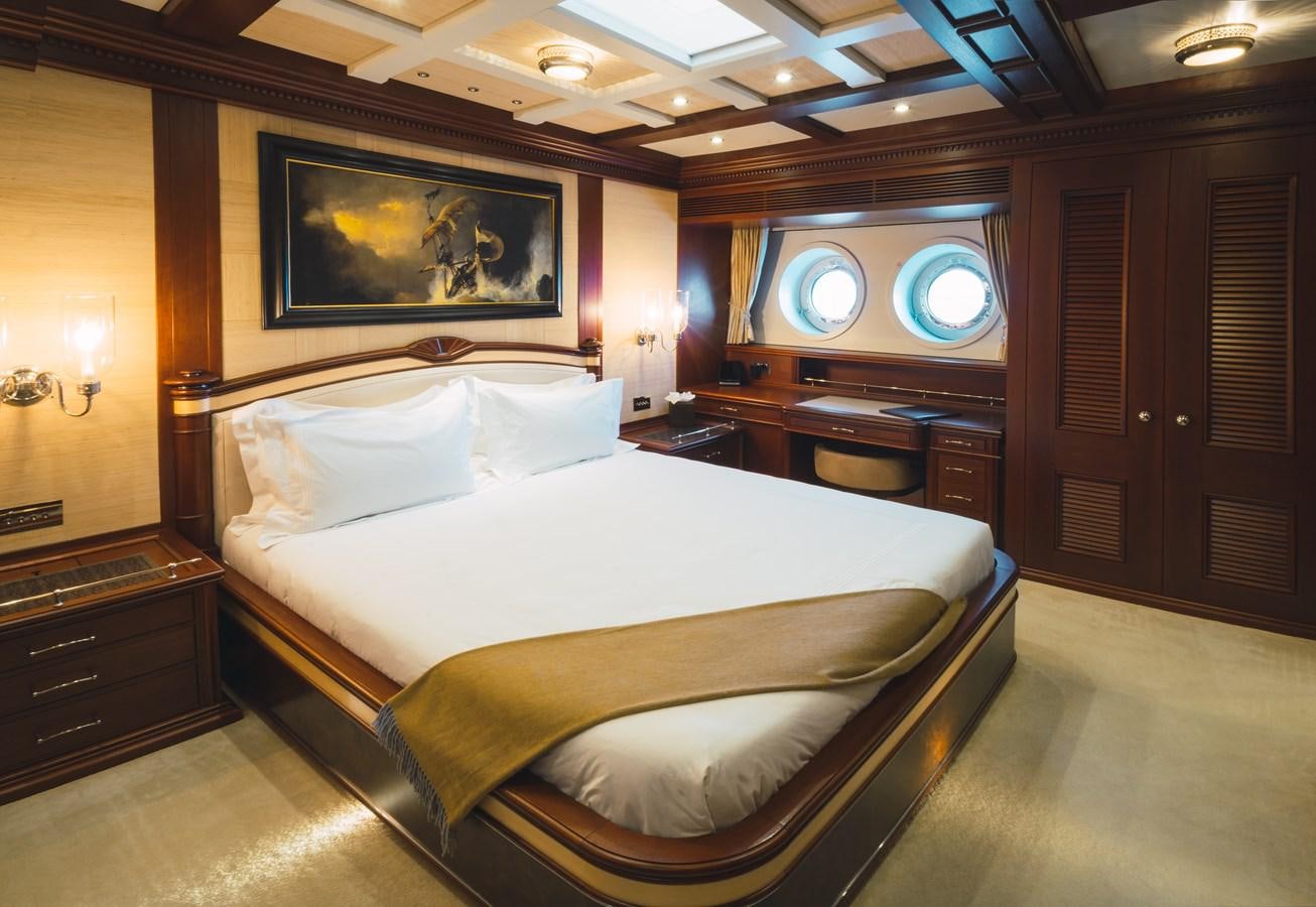 a large bed in a room aboard MIKHAIL S. VORONTSOV Yacht for Sale