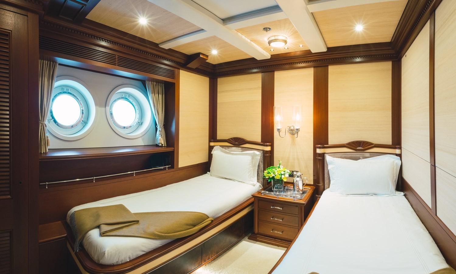 a room with two beds aboard MIKHAIL S. VORONTSOV Yacht for Sale