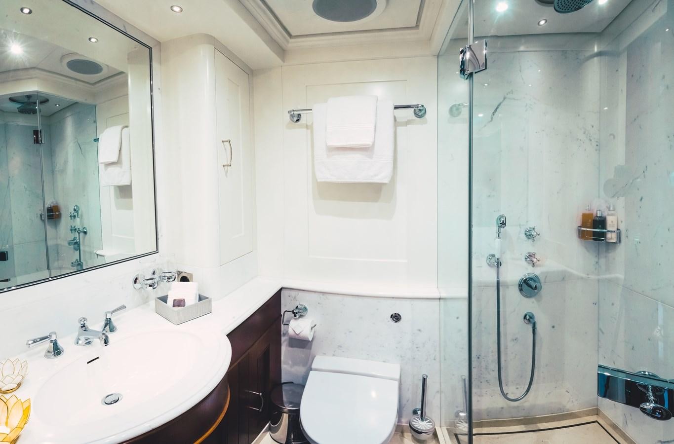a bathroom with a sink and a toilet aboard MIKHAIL S. VORONTSOV Yacht for Sale