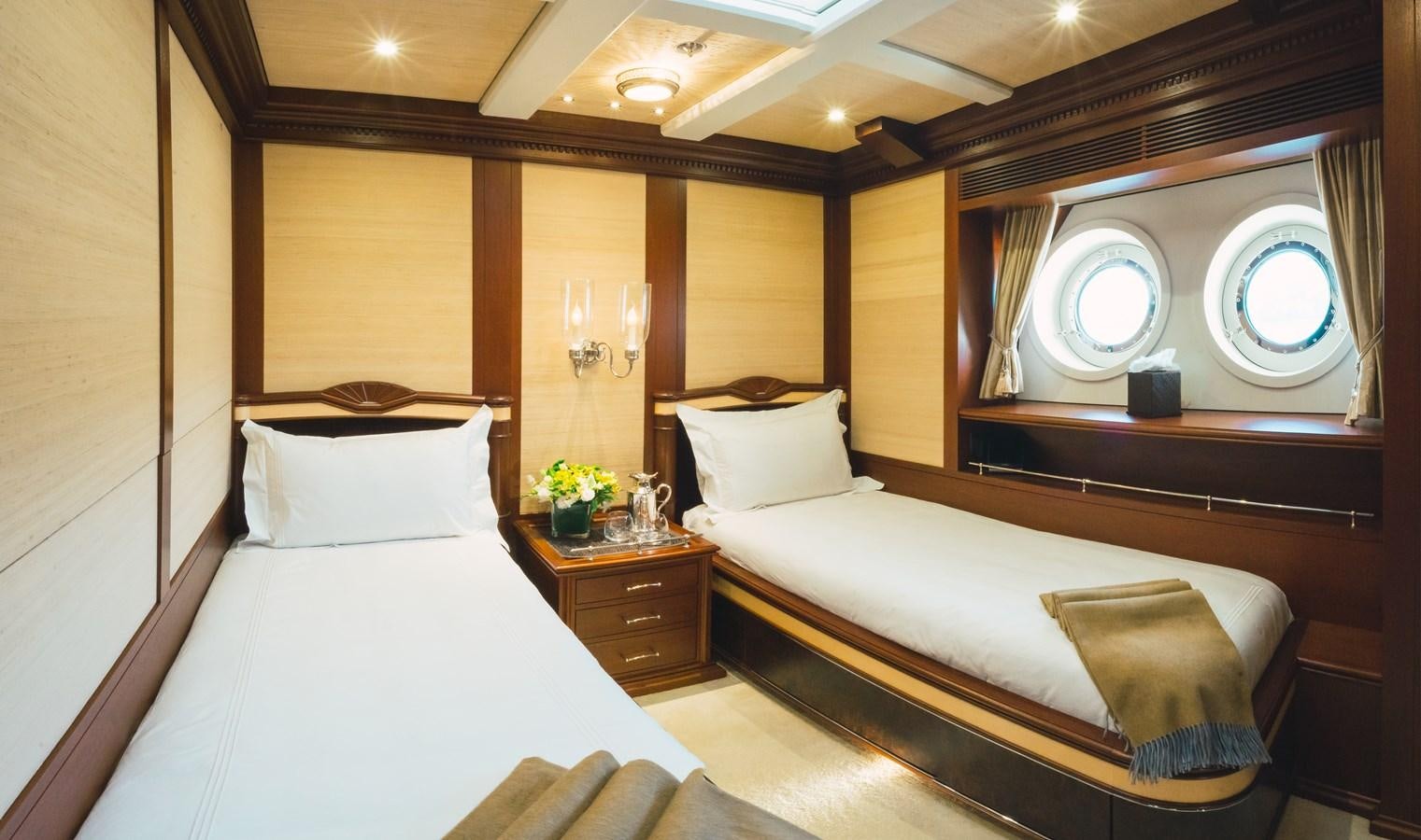 a room with two beds aboard MIKHAIL S. VORONTSOV Yacht for Sale