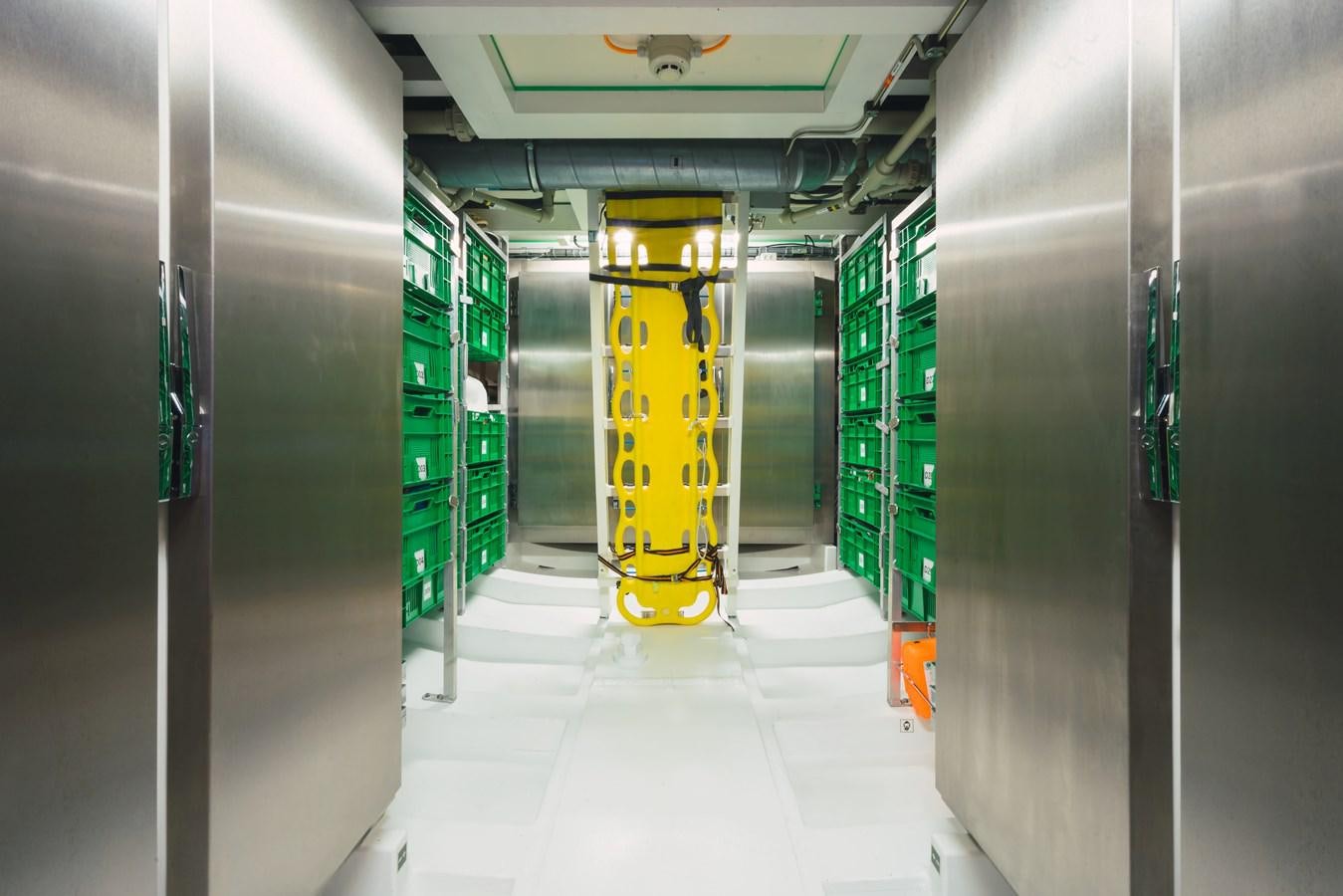 a yellow and blue column in a hallway aboard MIKHAIL S. VORONTSOV Yacht for Sale