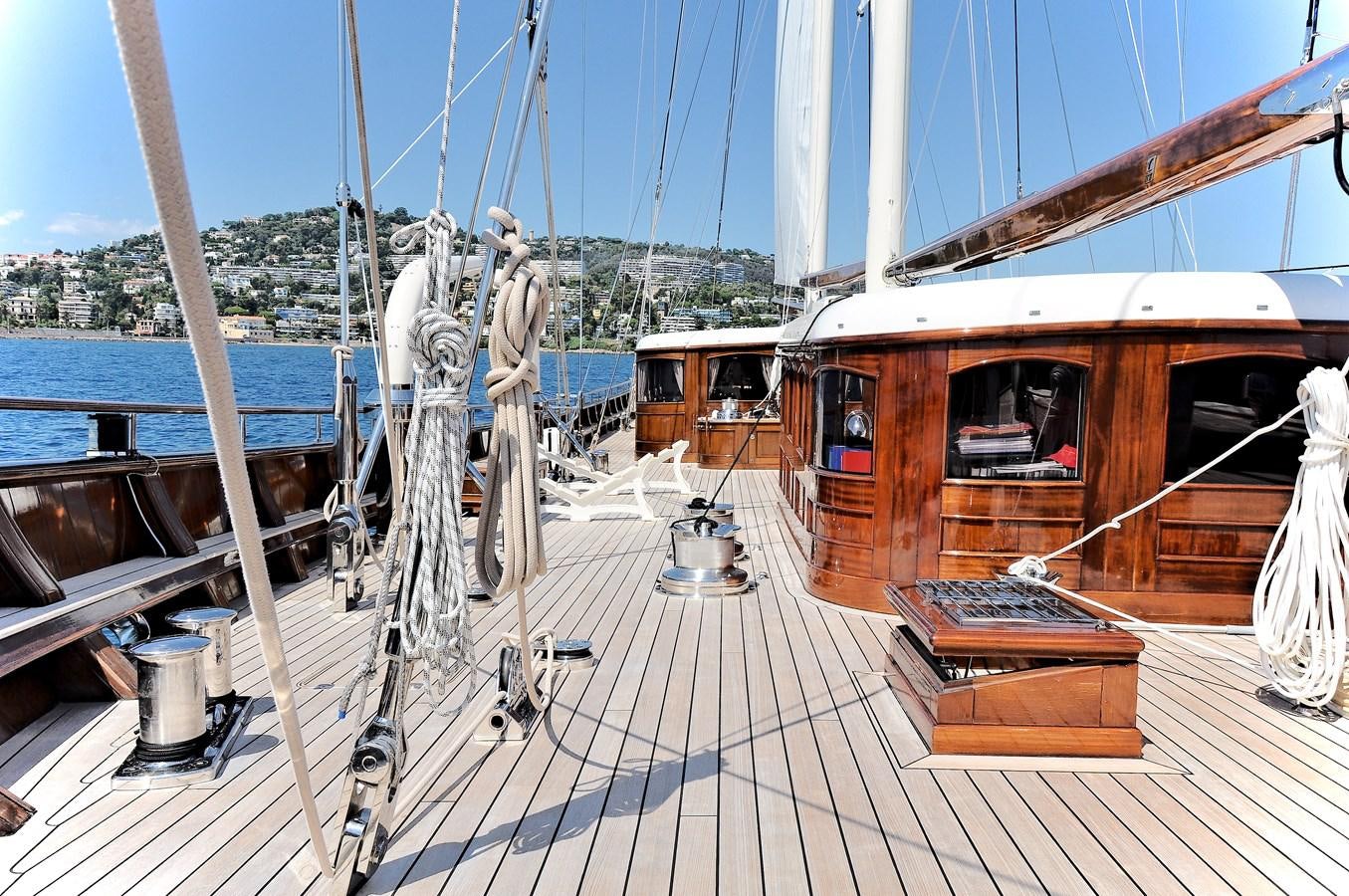 a wooden boat on a deck aboard MIKHAIL S. VORONTSOV Yacht for Sale
