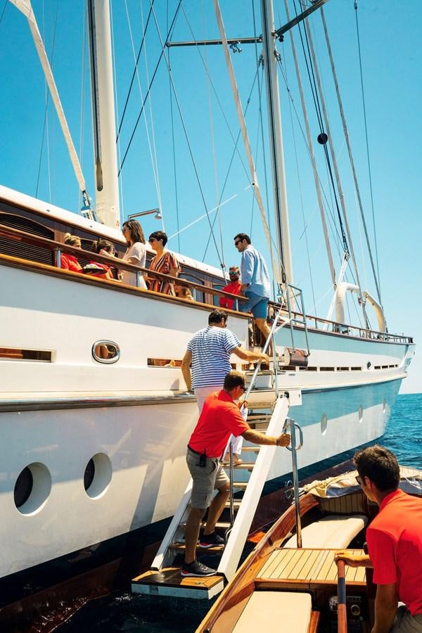 a group of people on a boat aboard MIKHAIL S. VORONTSOV Yacht for Sale