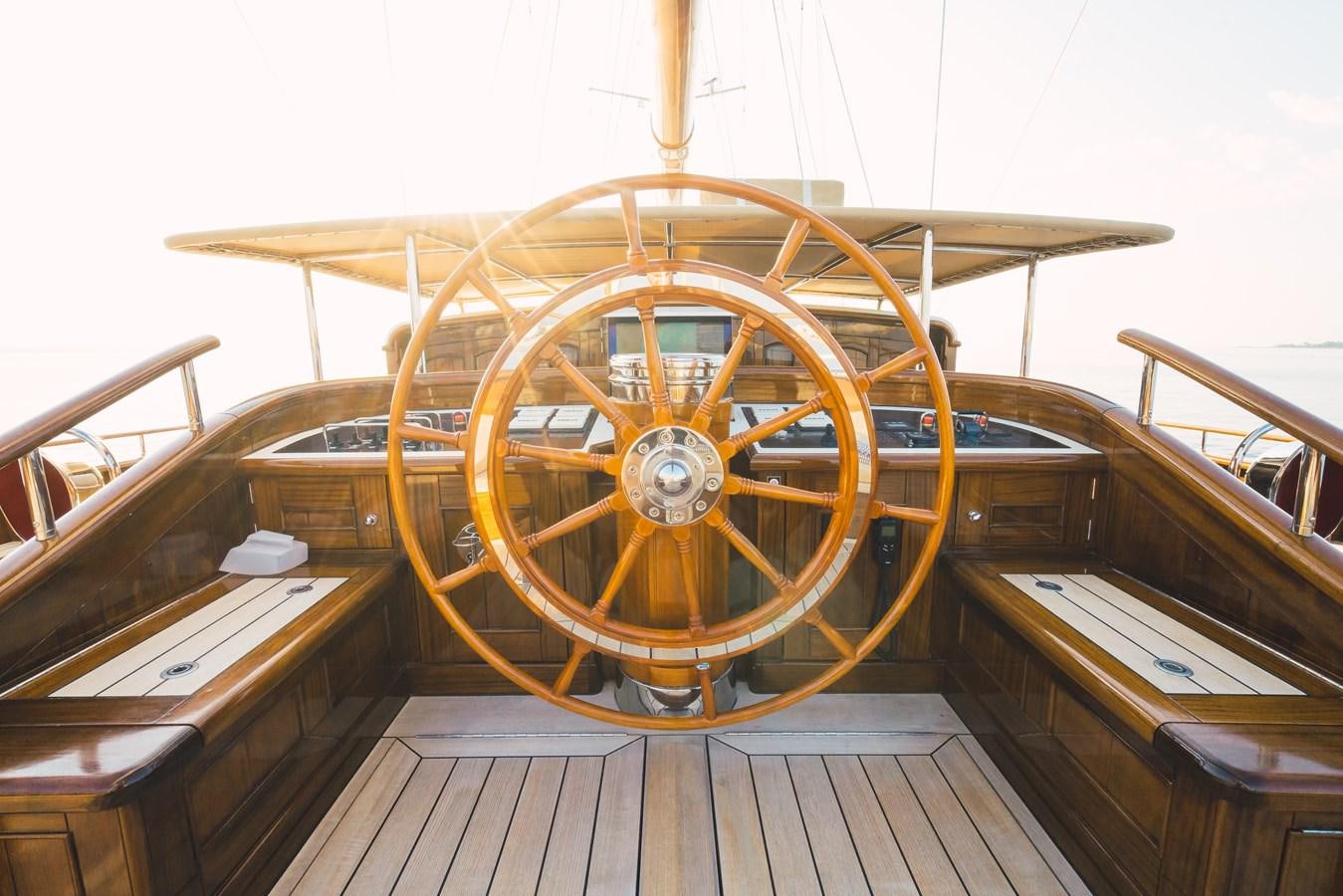 a wooden steering wheel on a boat aboard MIKHAIL S. VORONTSOV Yacht for Sale