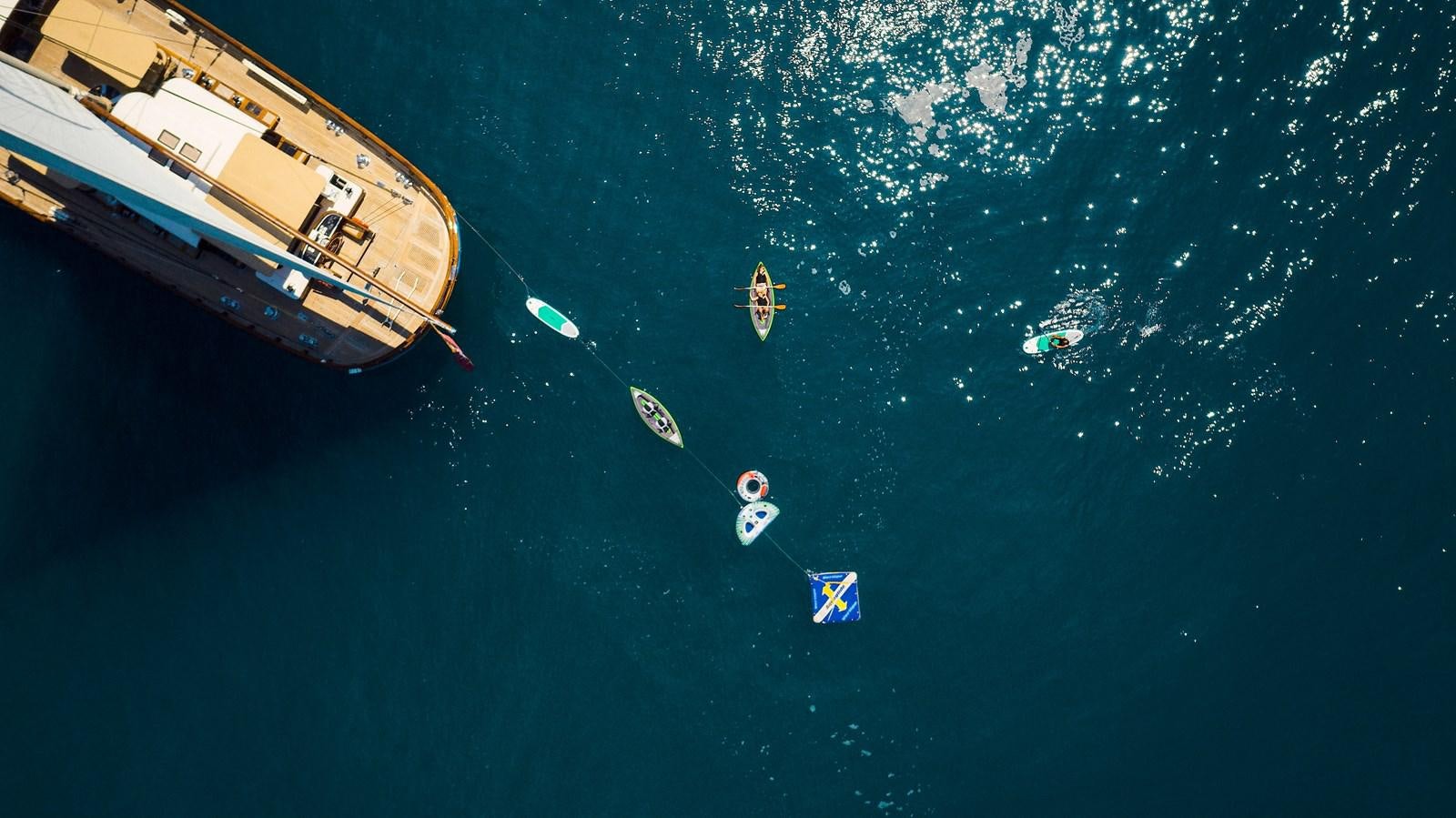 a group of people in the water aboard MIKHAIL S. VORONTSOV Yacht for Sale