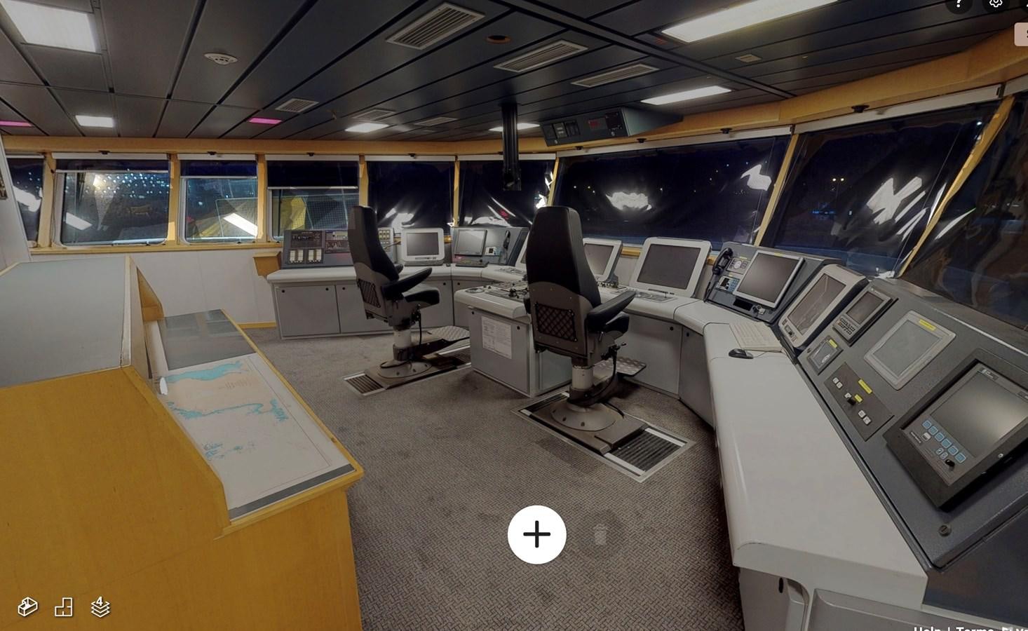 an empty office with computers aboard OCEAN XPLORER 71 Yacht for Sale