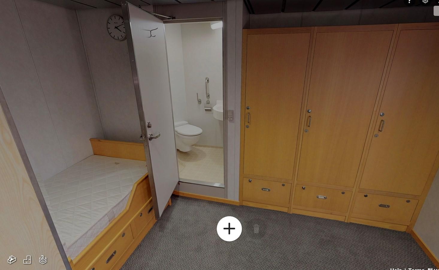 a bathroom with a toilet and a sink aboard OCEAN XPLORER 71 Yacht for Sale