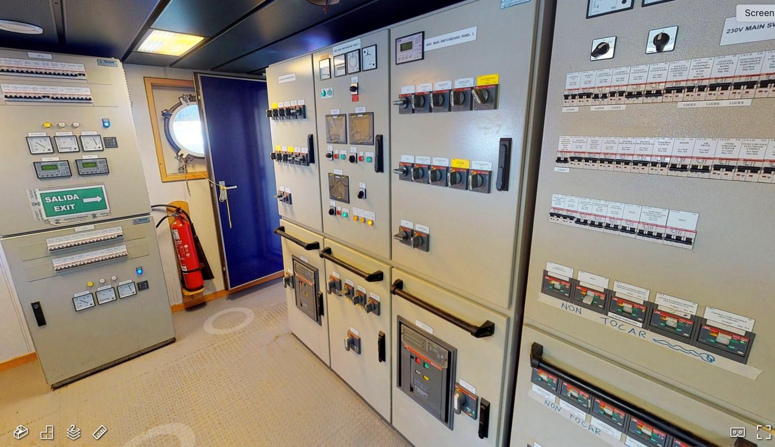 a room with machines and buttons aboard OCEAN XPLORER 71 Yacht for Sale