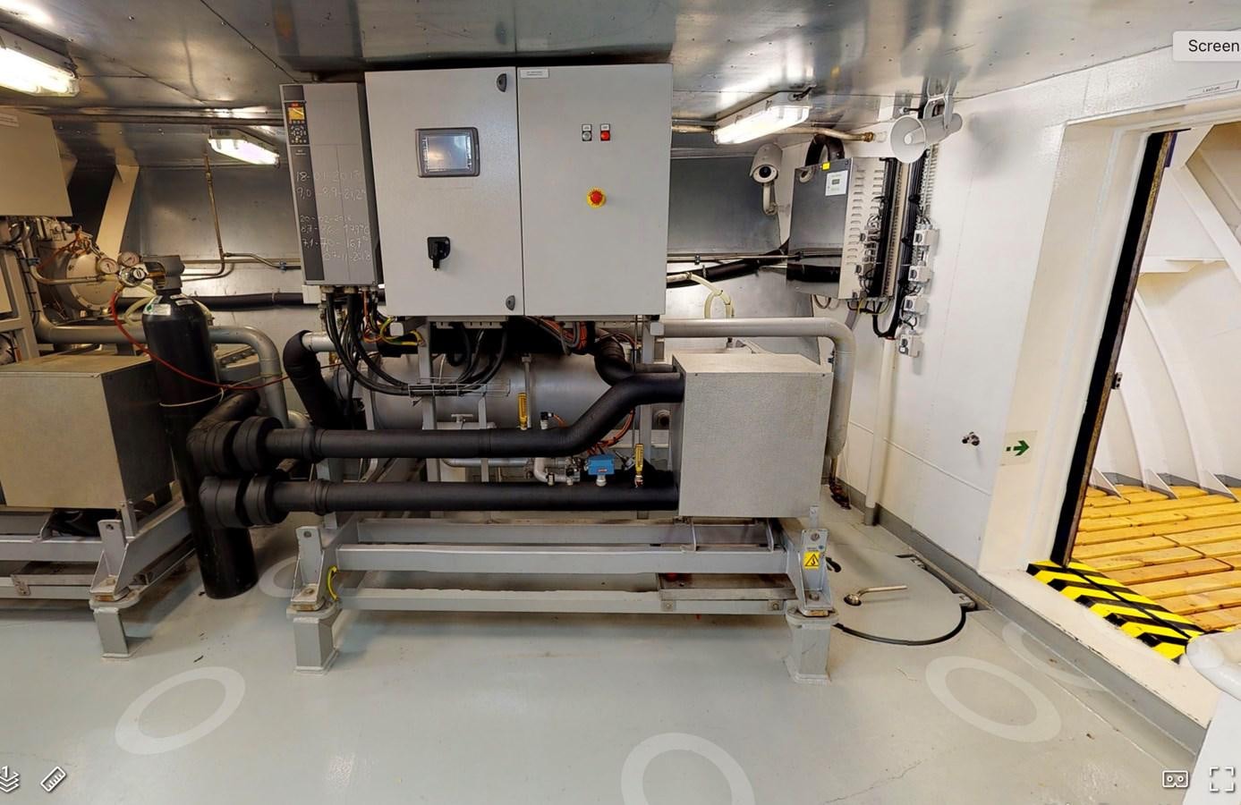 a machine in a room aboard OCEAN XPLORER 71 Yacht for Sale