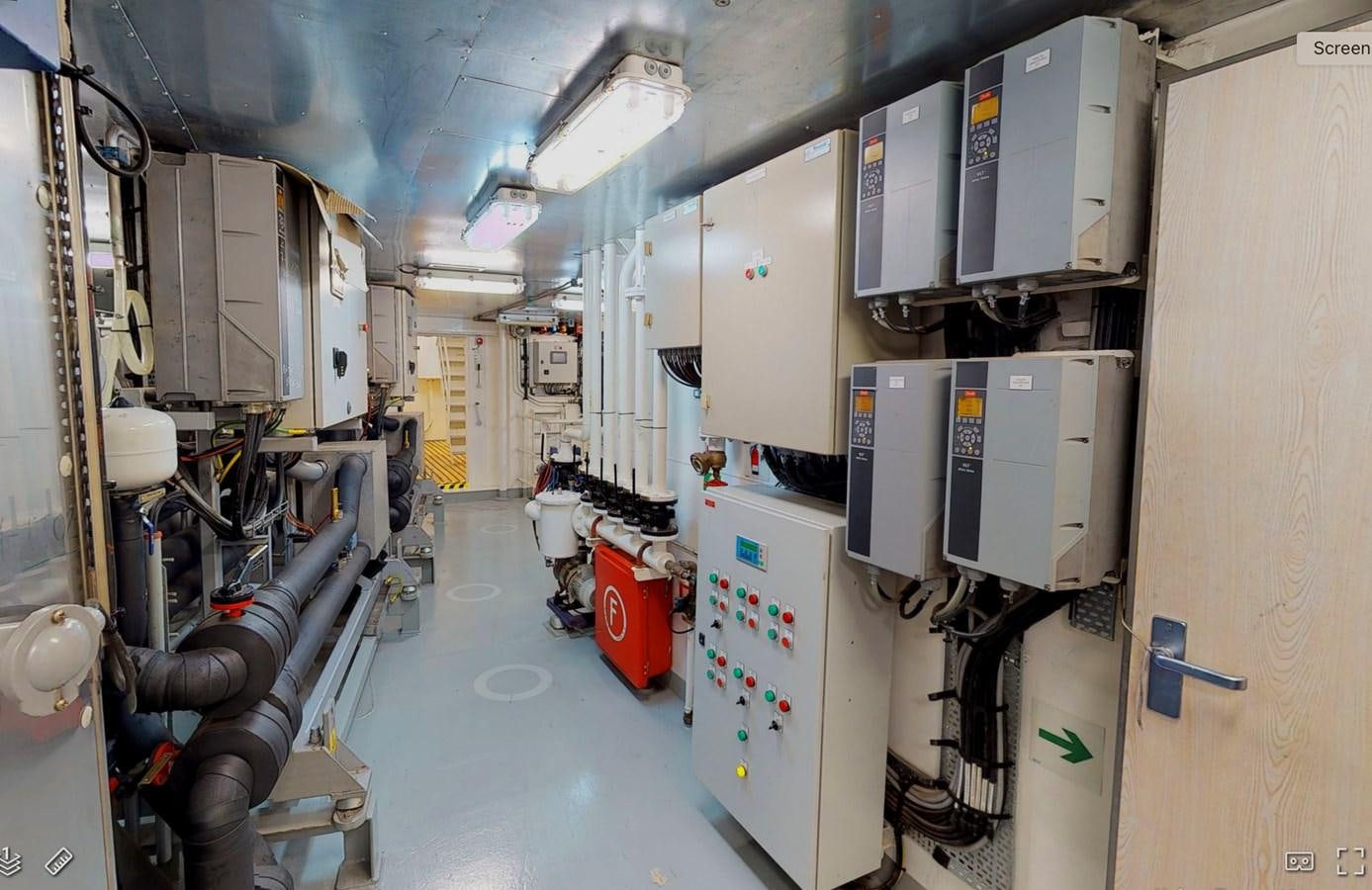 a room with machinery aboard OCEAN XPLORER 71 Yacht for Sale