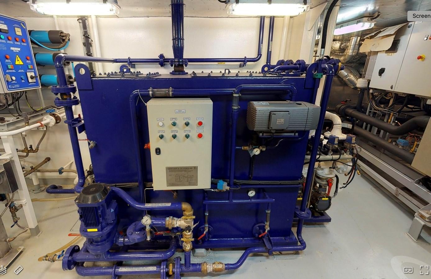 a machine with blue and red parts aboard OCEAN XPLORER 71 Yacht for Sale