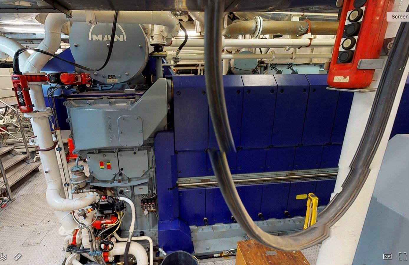 a machine with a large piece of equipment on it aboard OCEAN XPLORER 71 Yacht for Sale