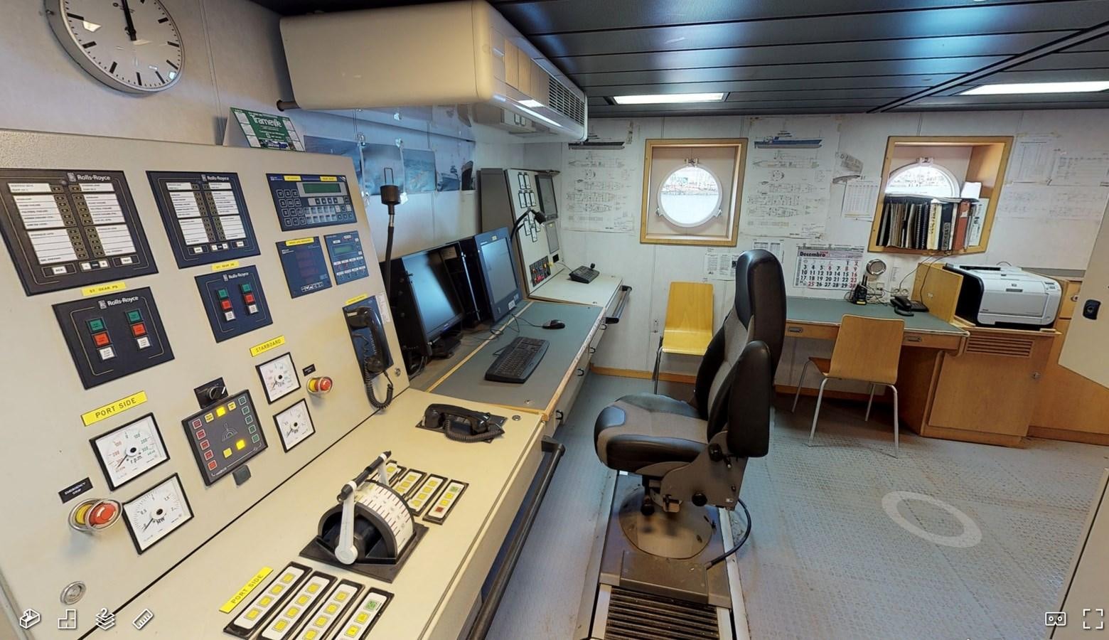 an office with a desk and computer aboard OCEAN XPLORER 71 Yacht for Sale
