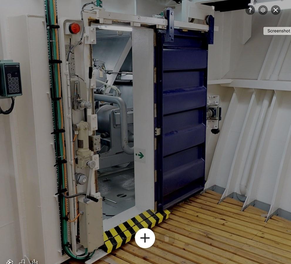 a machine inside a room aboard OCEAN XPLORER 71 Yacht for Sale