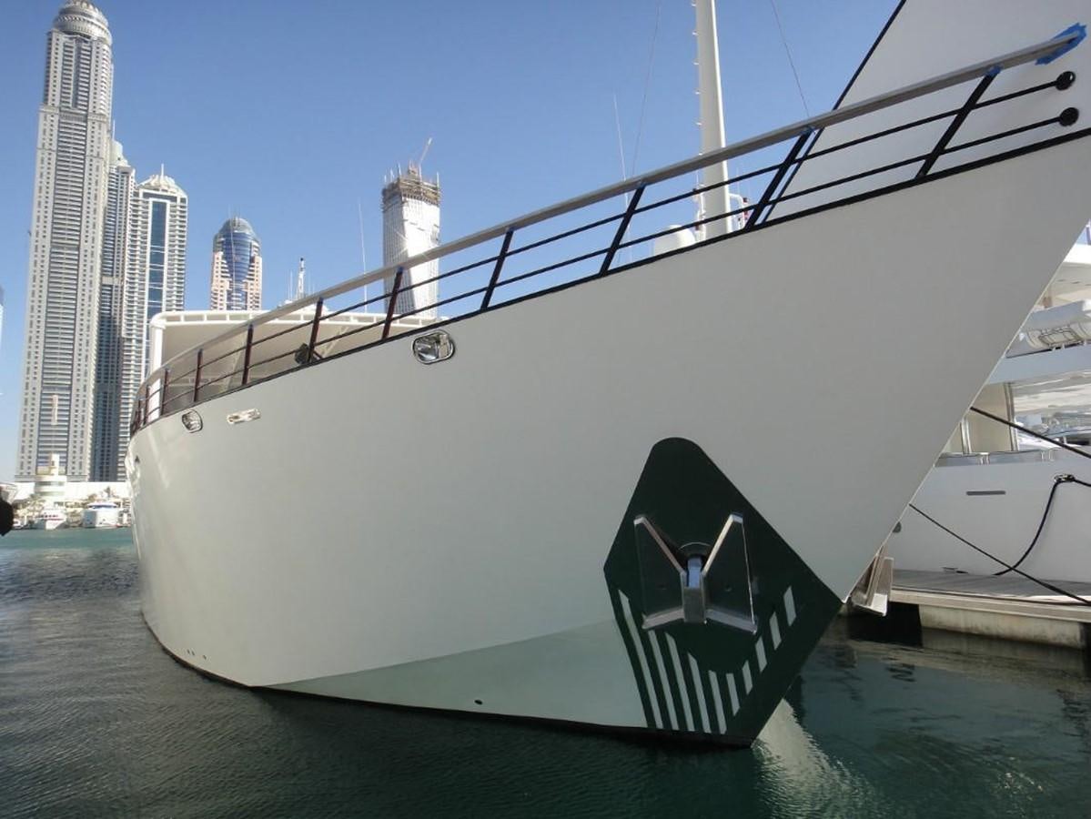 a large white boat with a black and white design on it aboard WARSAN Yacht for Sale
