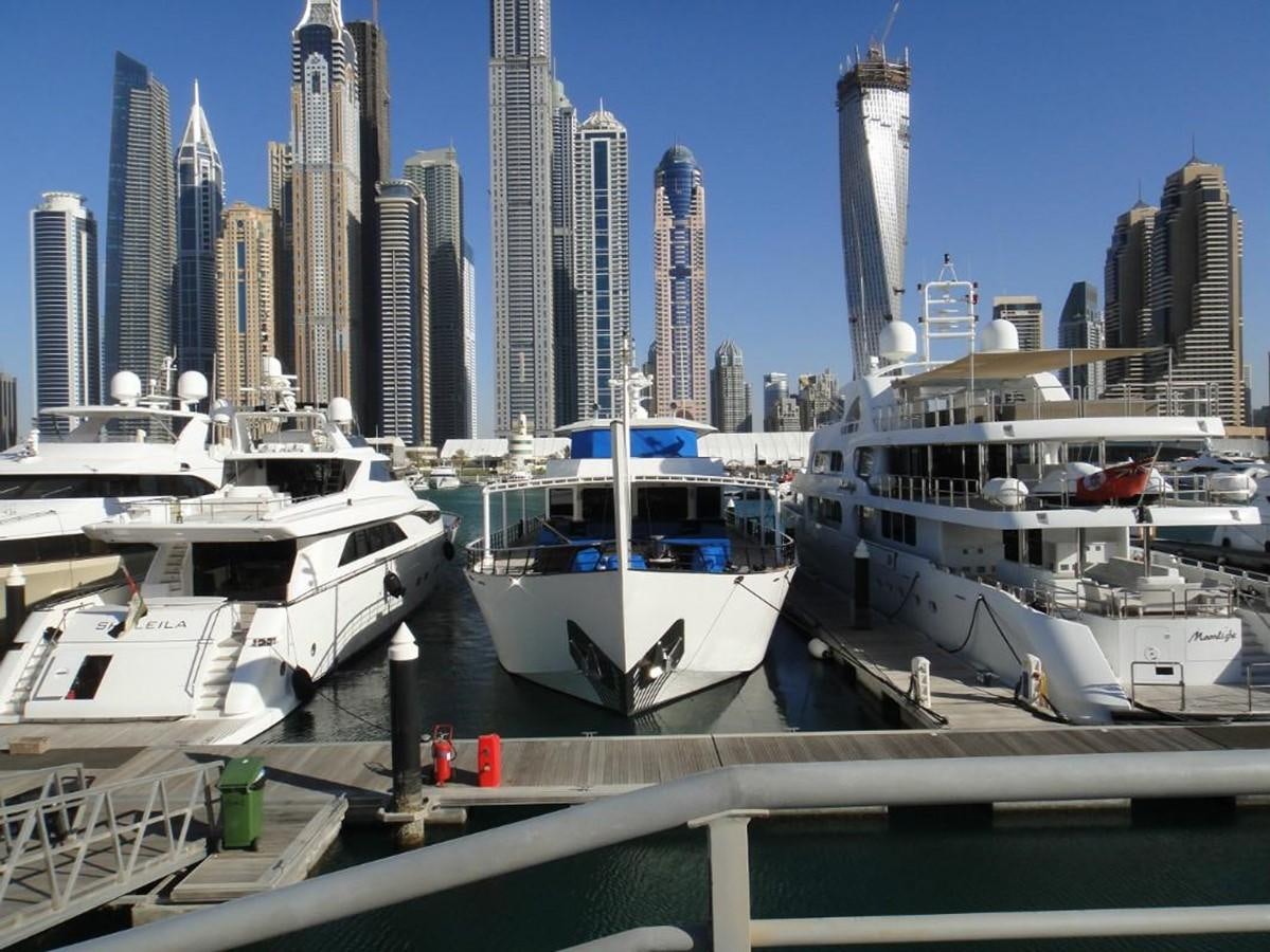 boats docked in a harbor aboard WARSAN Yacht for Sale