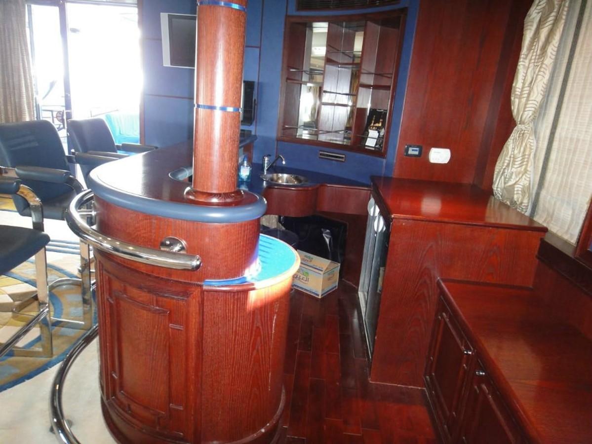 a brown and brown drum set in a room with other furniture aboard WARSAN Yacht for Sale