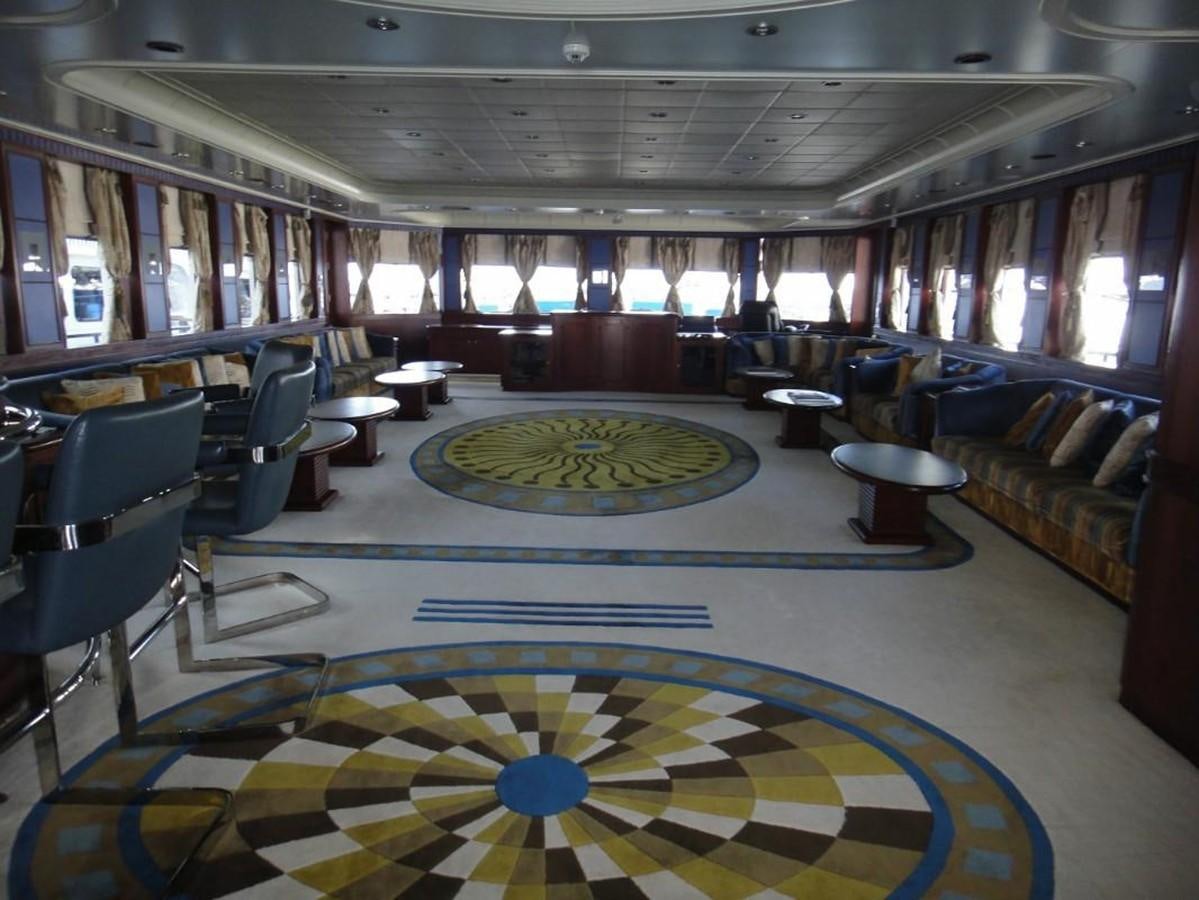 a large room with a rug aboard WARSAN Yacht for Sale