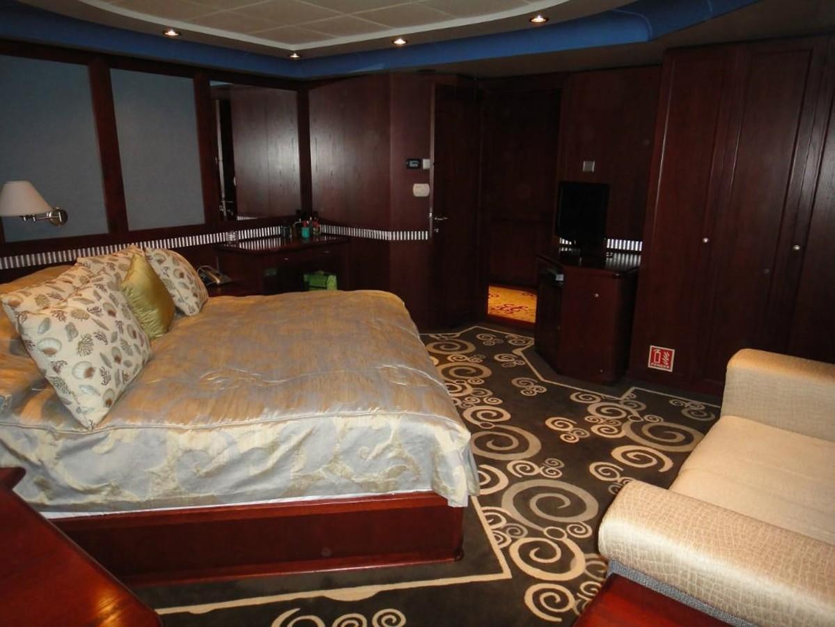 a bed in a room aboard WARSAN Yacht for Sale