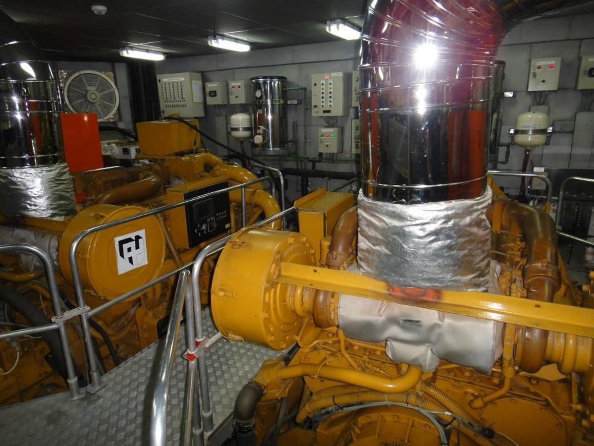 a factory with large tubes aboard WARSAN Yacht for Sale