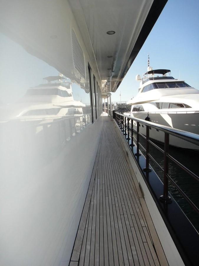 a boat is parked on the side of a road aboard WARSAN Yacht for Sale