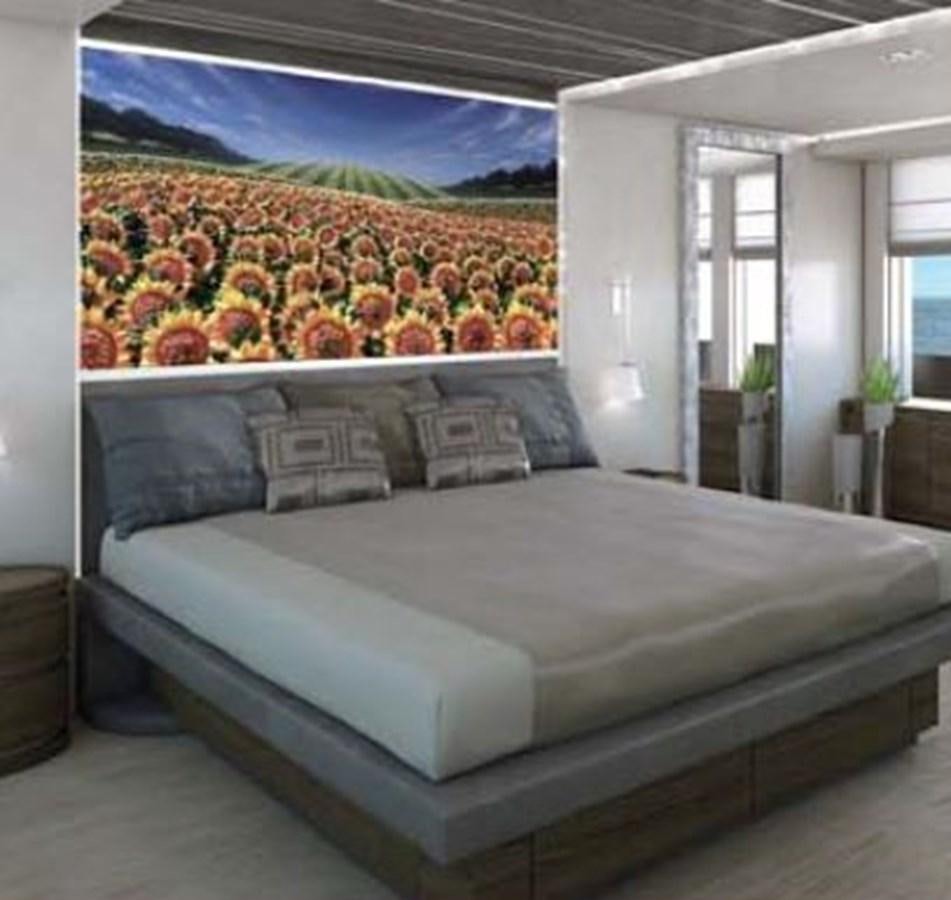 a bed with a large painting on the wall aboard NEW BUILD Yacht for Sale