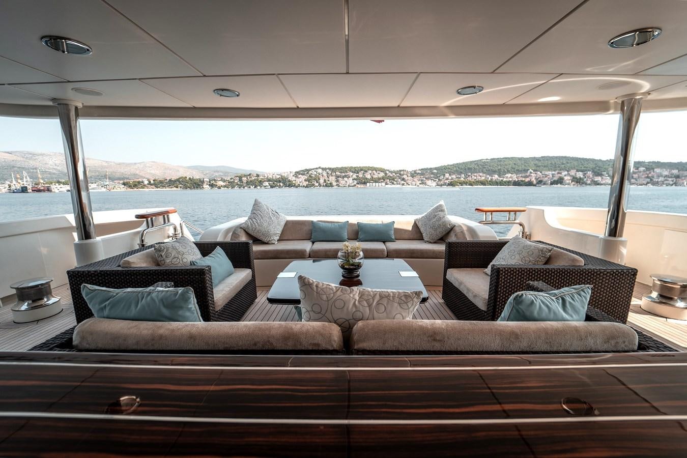 a room with a couch and a table aboard MERCURY Yacht for Sale