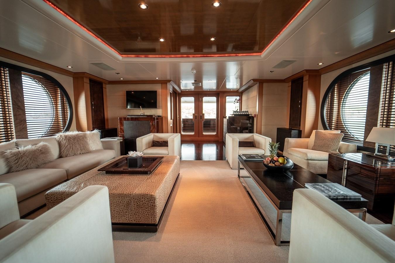 a living room with a large open door aboard MERCURY Yacht for Sale