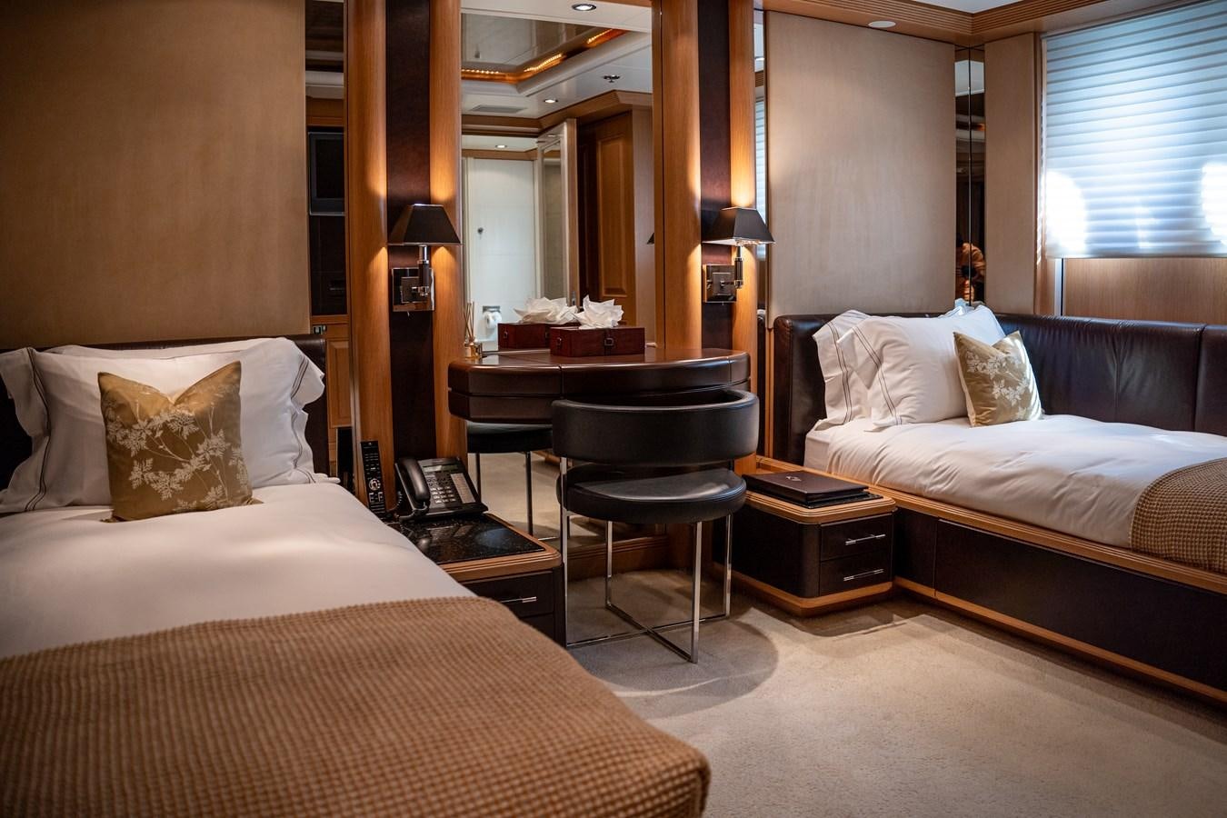 a hotel room with two beds aboard MERCURY Yacht for Sale