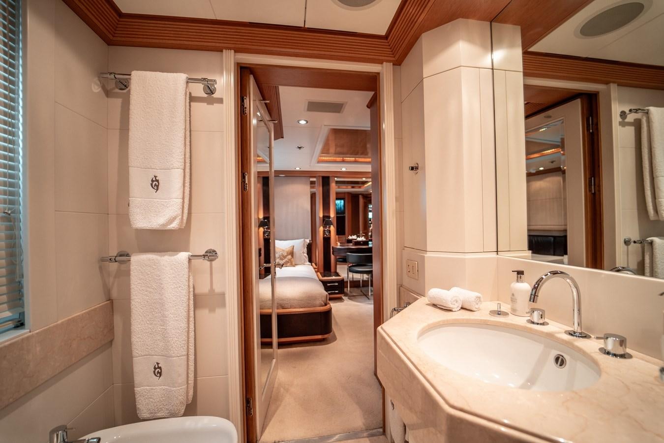 a bathroom with a sink and a bathtub aboard MERCURY Yacht for Sale