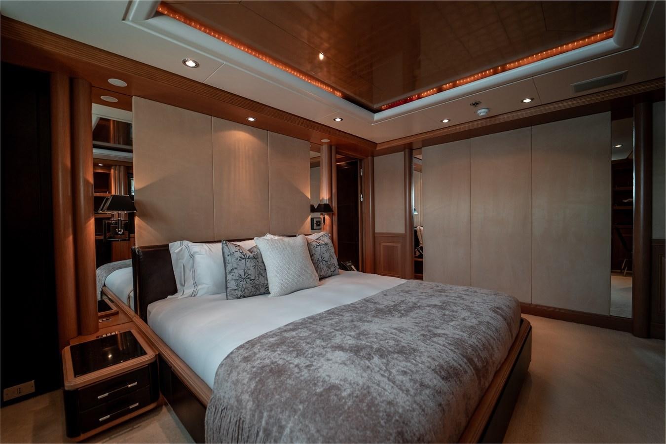 a bed in a room aboard MERCURY Yacht for Sale