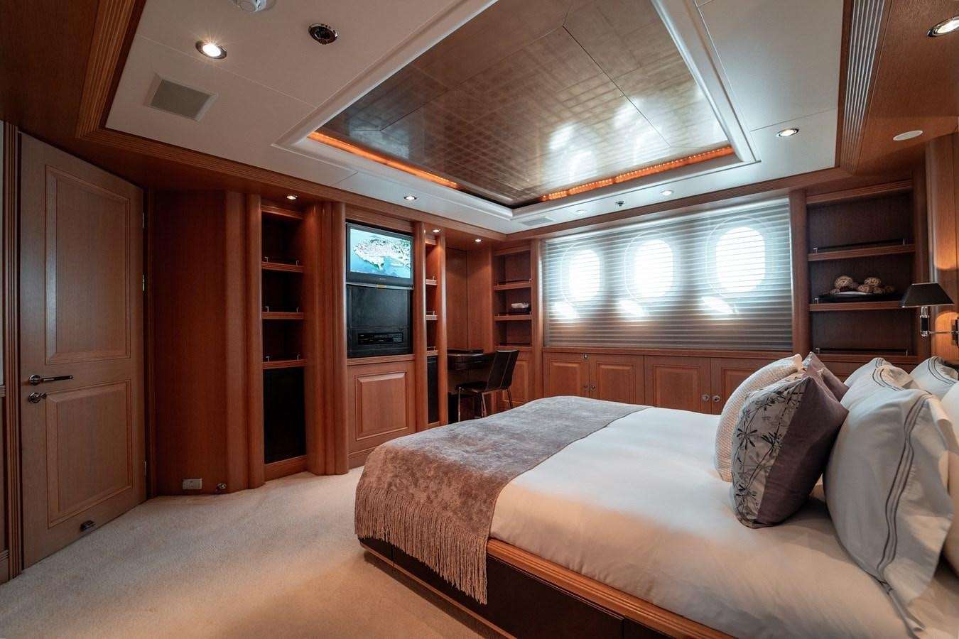 a room with a bed and a tv aboard MERCURY Yacht for Sale