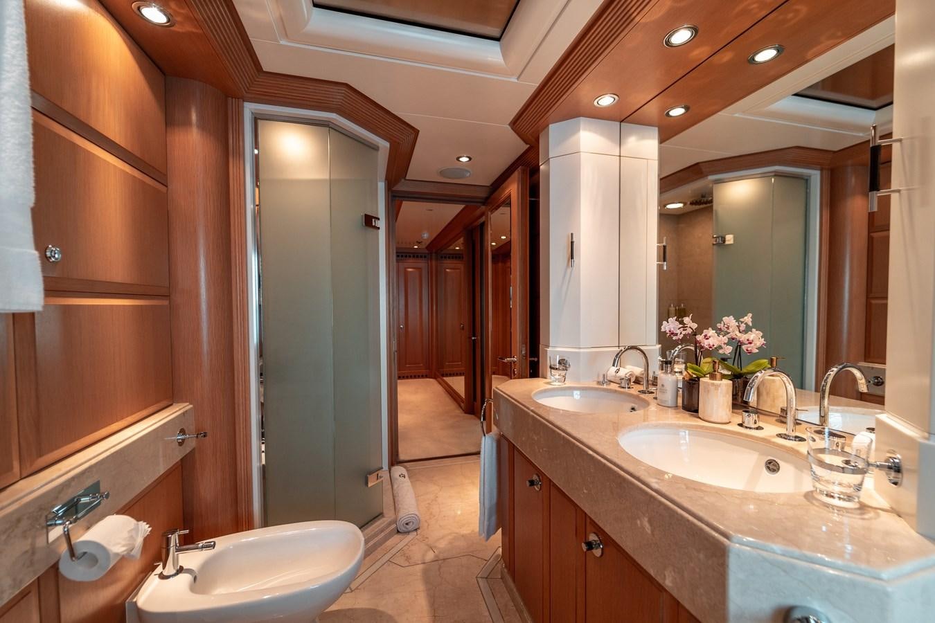 a bathroom with a large mirror aboard MERCURY Yacht for Sale
