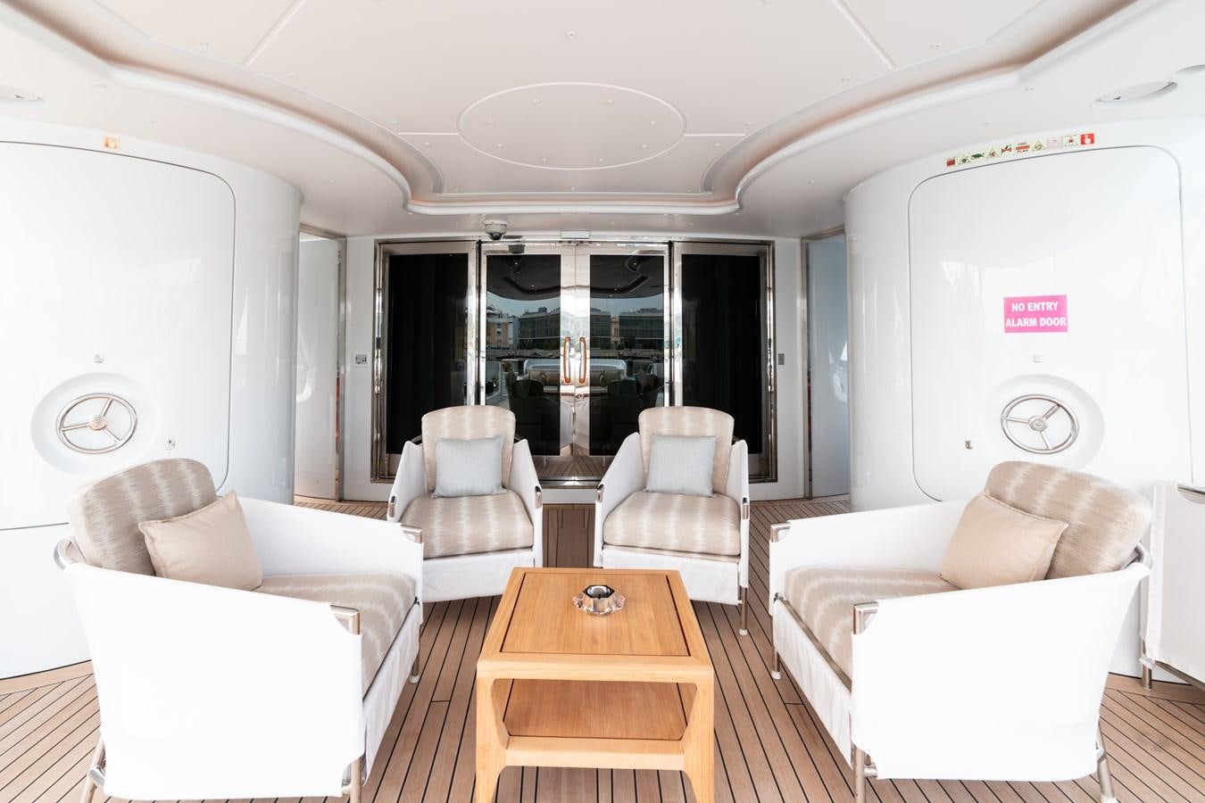 a living room with a table and chairs aboard UNDER CONTRACT!   SAINT  2012 ISA 500-2 POP @ Yacht for Sale