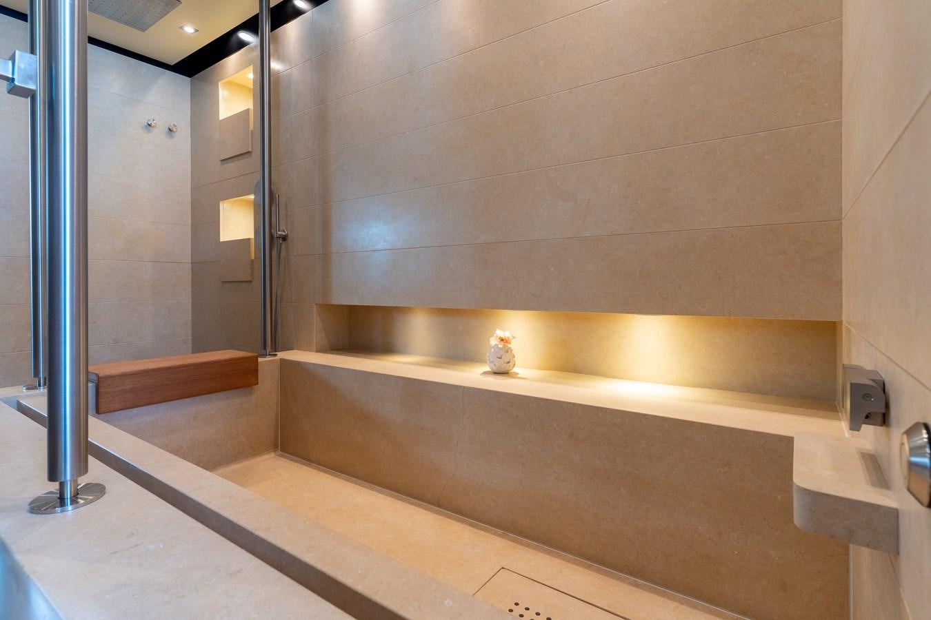 a bathroom with a bathtub aboard UNDER CONTRACT!   SAINT  2012 ISA 500-2 POP @ Yacht for Sale