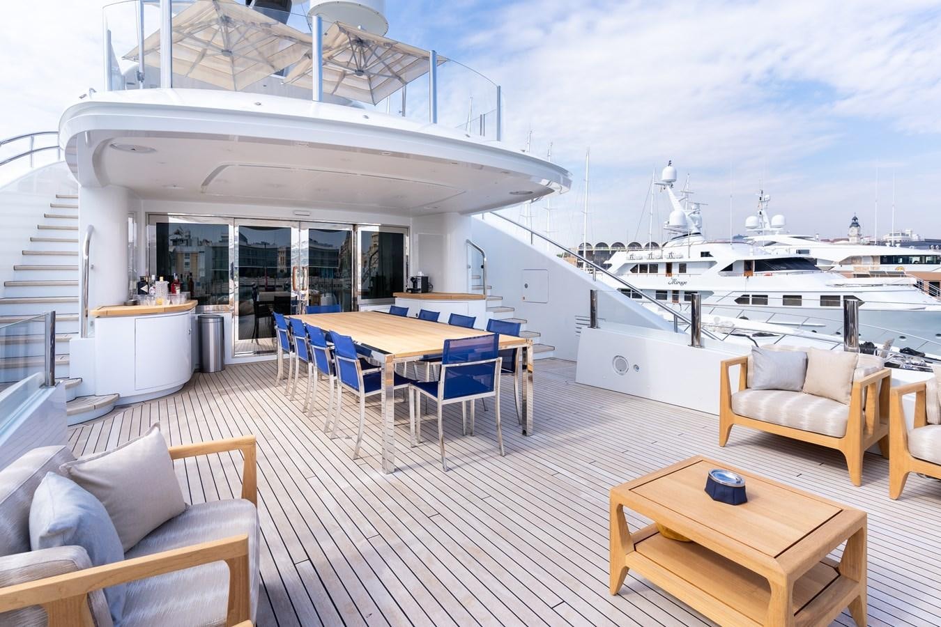 a large white building with a deck and chairs and a table with a pool and a deck with aboard UNDER CONTRACT!   SAINT  2012 ISA 500-2 POP @ Yacht for Sale