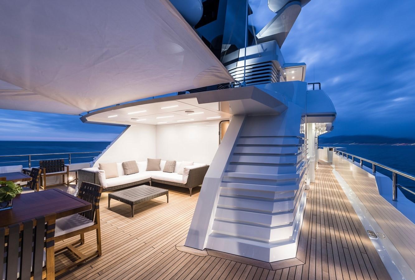 a deck with a large deck overlooking the ocean aboard I NOVA Yacht for Sale
