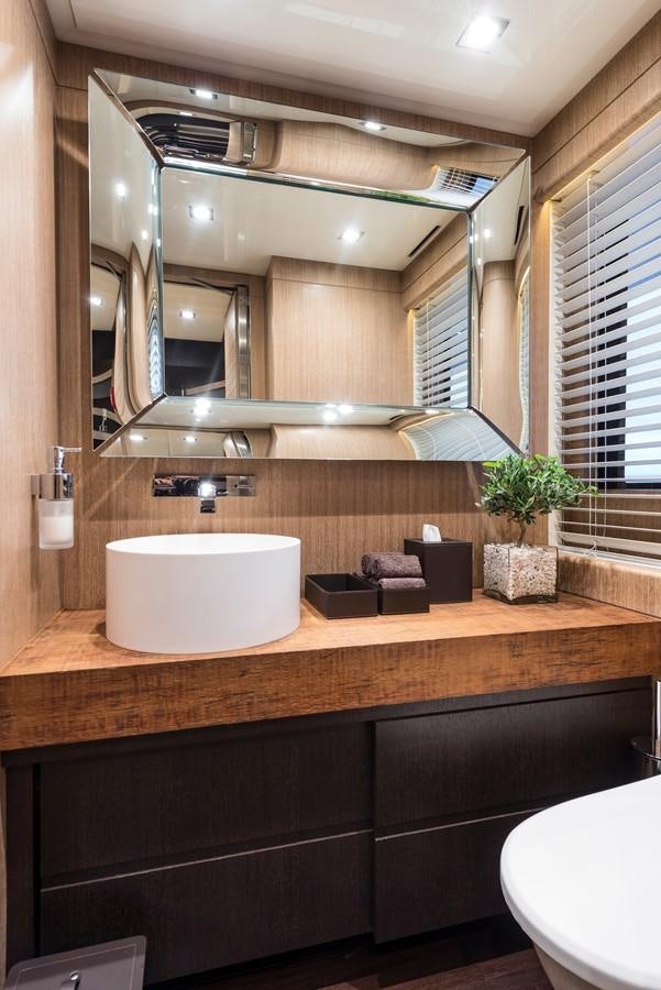 a bathroom with a large mirror aboard I NOVA Yacht for Sale