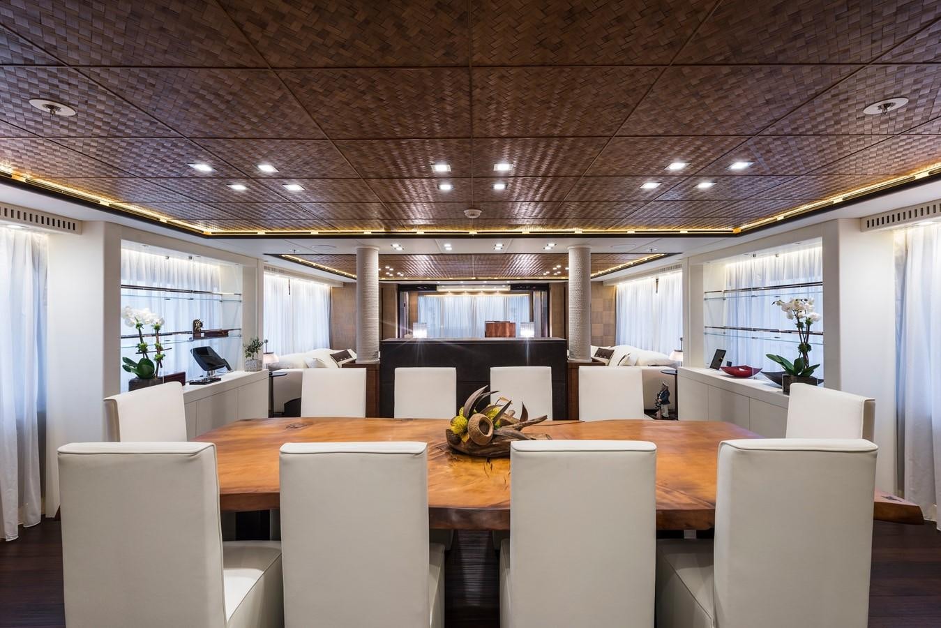 a room with tables and chairs aboard I NOVA Yacht for Sale