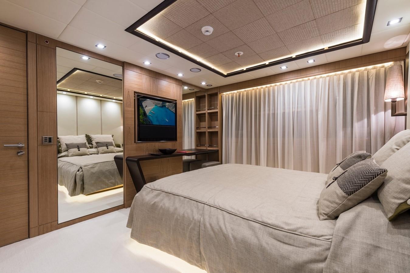 a hotel room with a bed and a tv aboard I NOVA Yacht for Sale