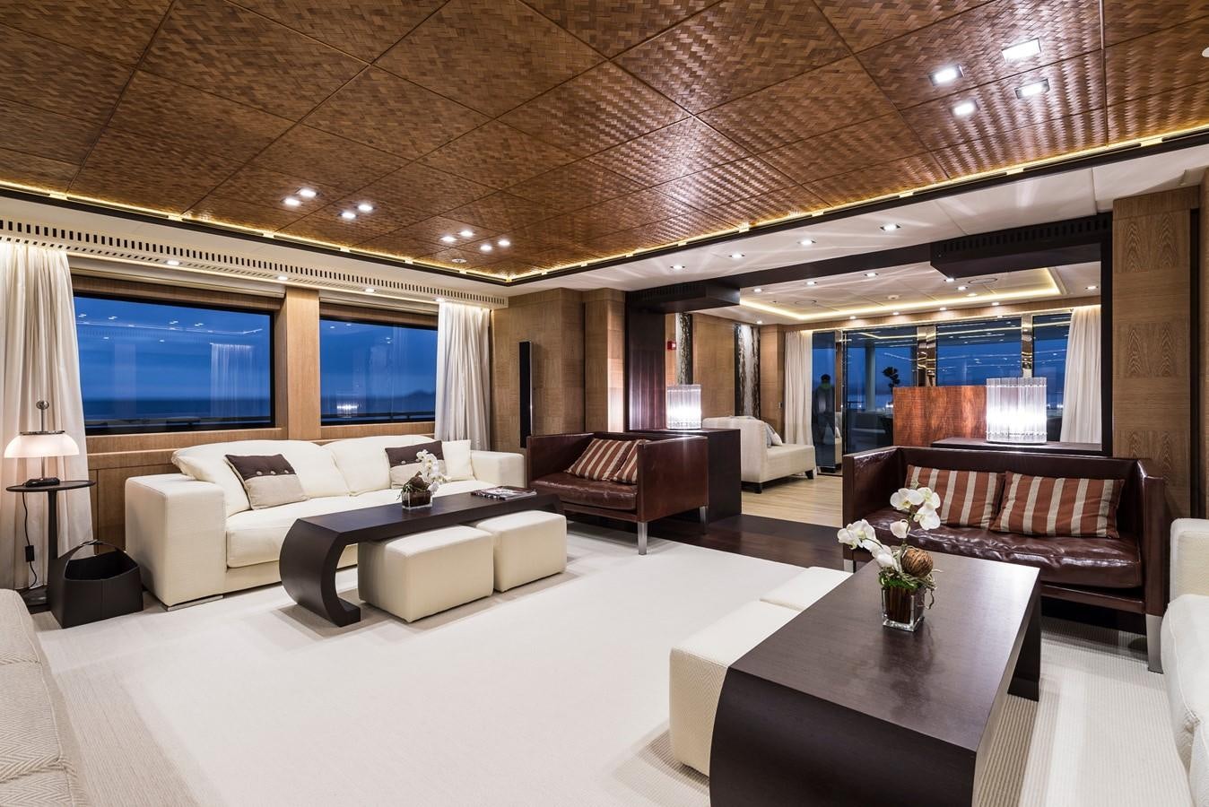 a large room with a couch and a table aboard I NOVA Yacht for Sale