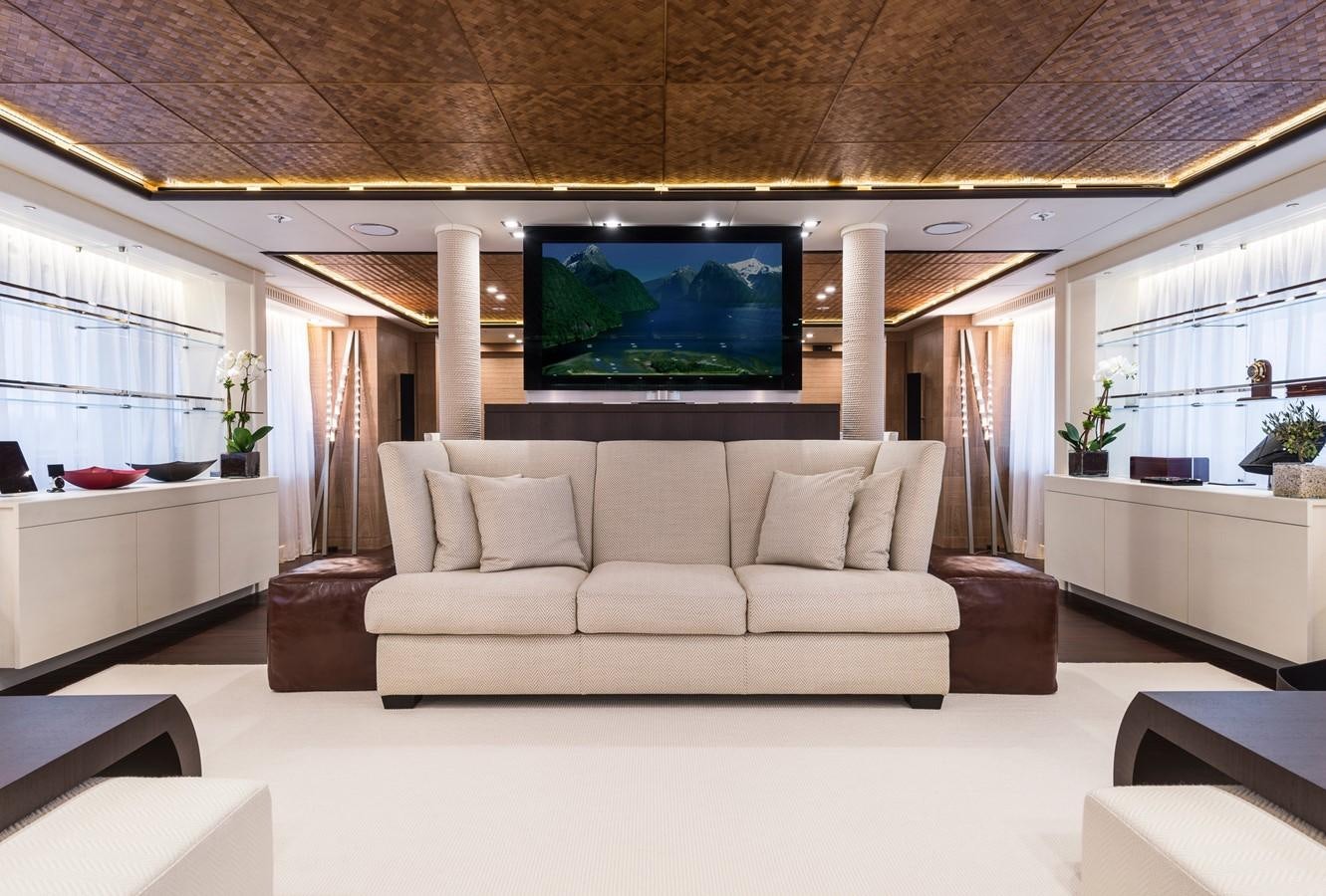a living room with a large screen aboard I NOVA Yacht for Sale