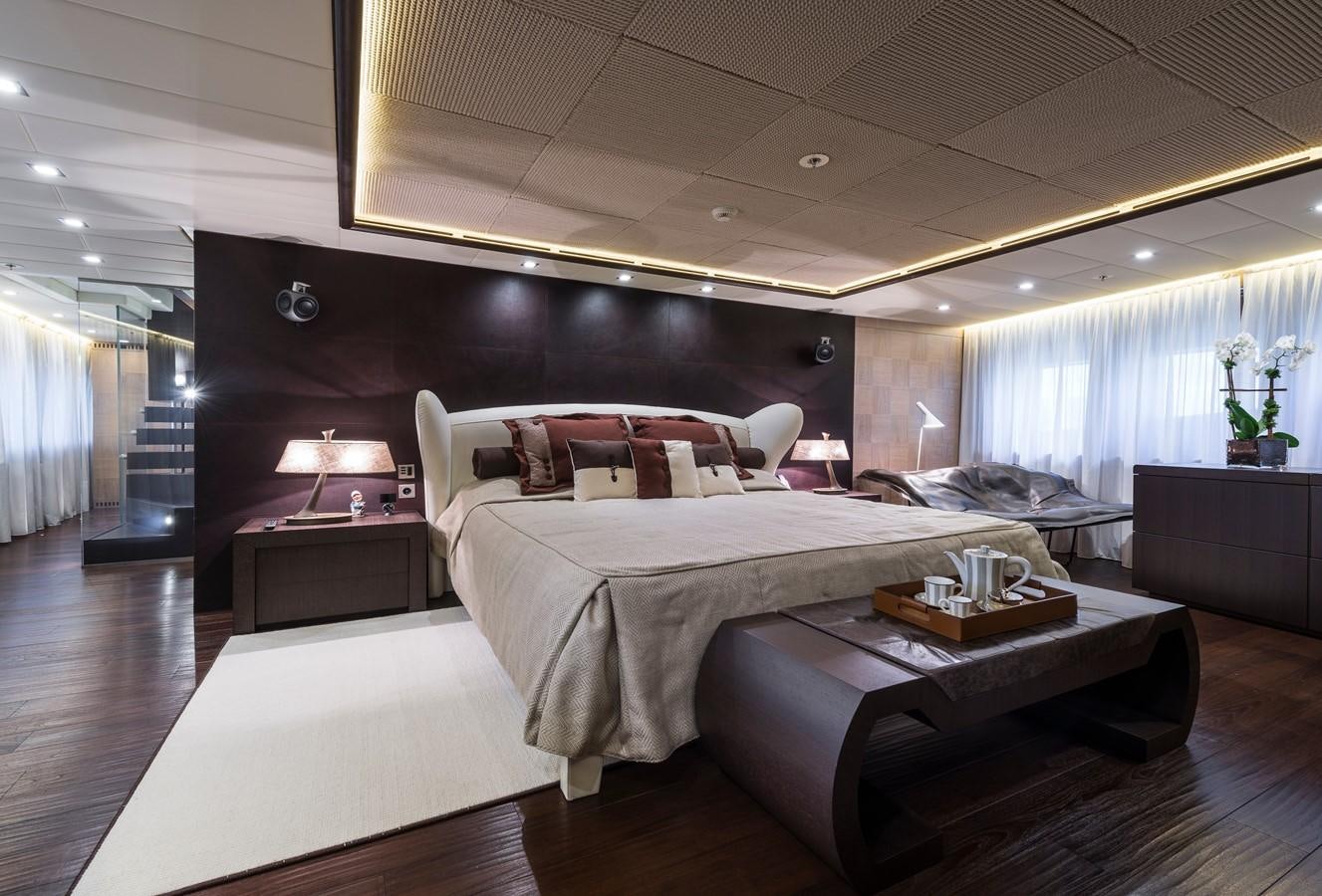 a room with a bed and a couch aboard I NOVA Yacht for Sale