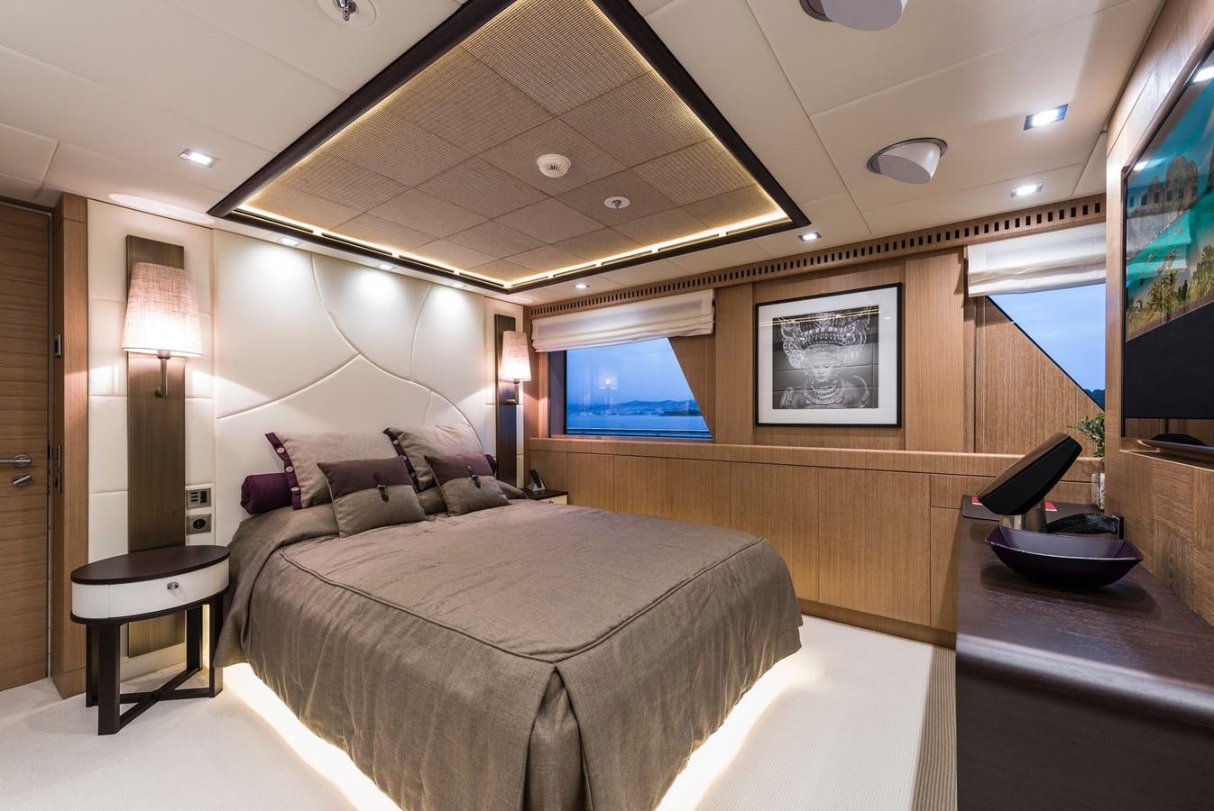 a bedroom with a large bed aboard I NOVA Yacht for Sale