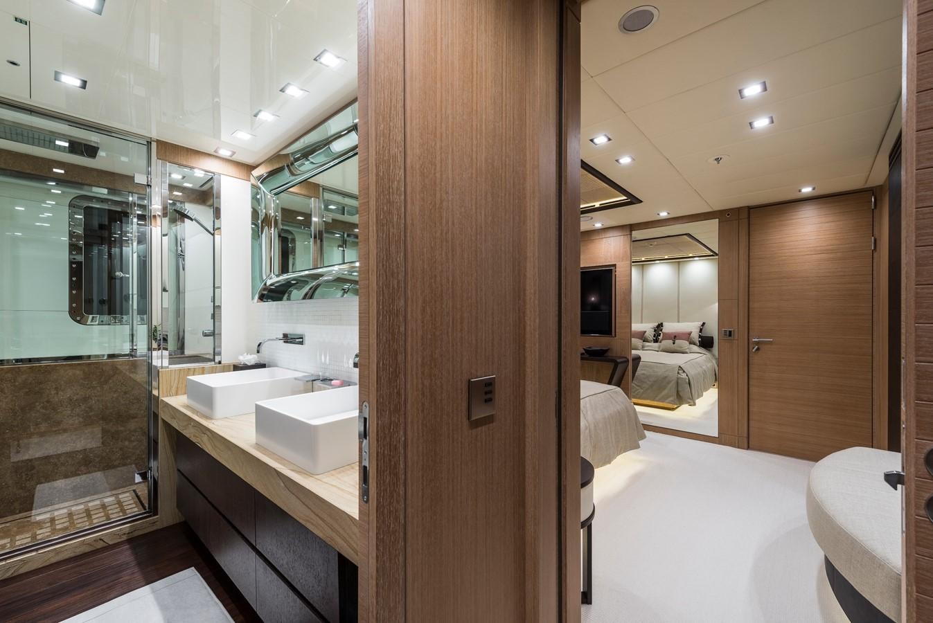 a bathroom with a large mirror aboard I NOVA Yacht for Sale
