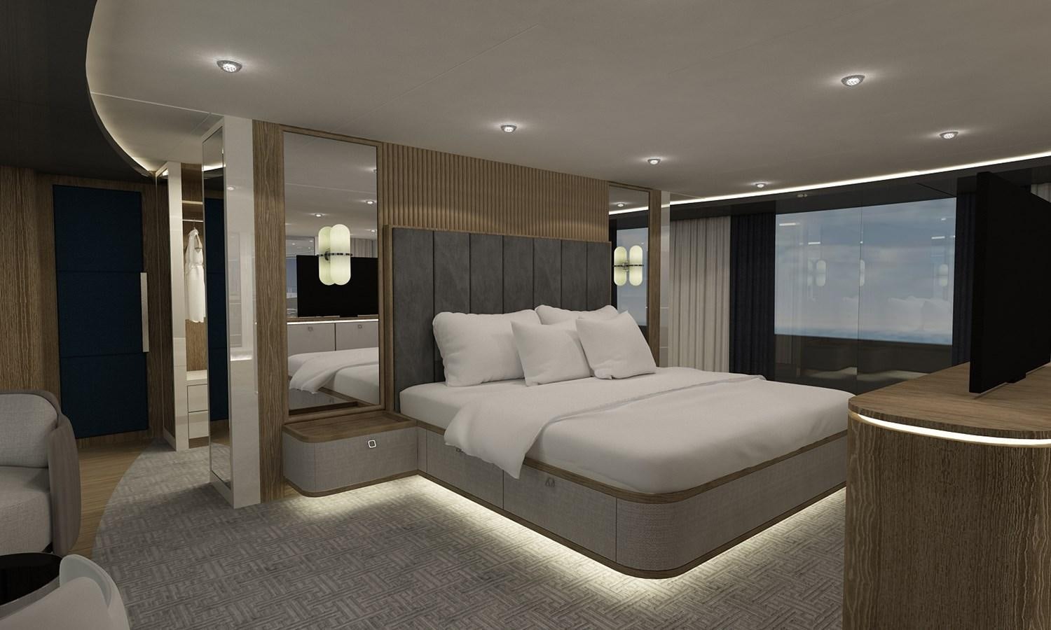 a large hotel room with a large bed and a large window aboard CMB 47 SERIES Yacht for Sale