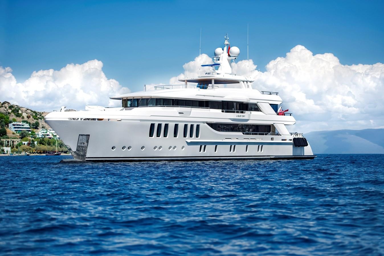 a large white boat in the water aboard CMB 47 SERIES Yacht for Sale